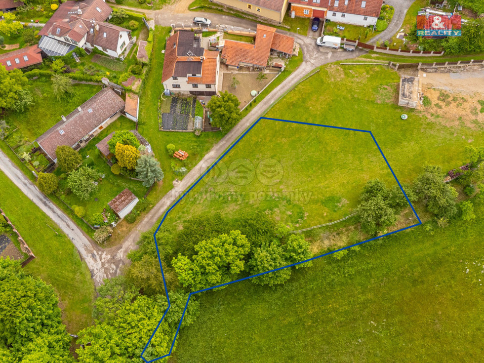 Prodej stavební parcely 1373 m², Popovice