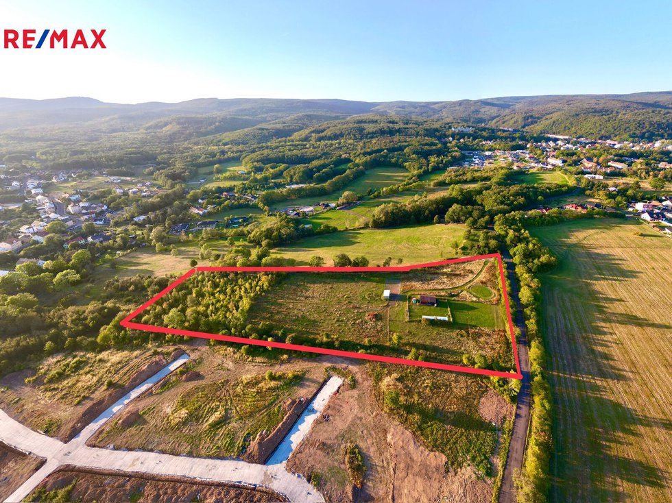 Prodej stavební parcely 23011 m², Dubí