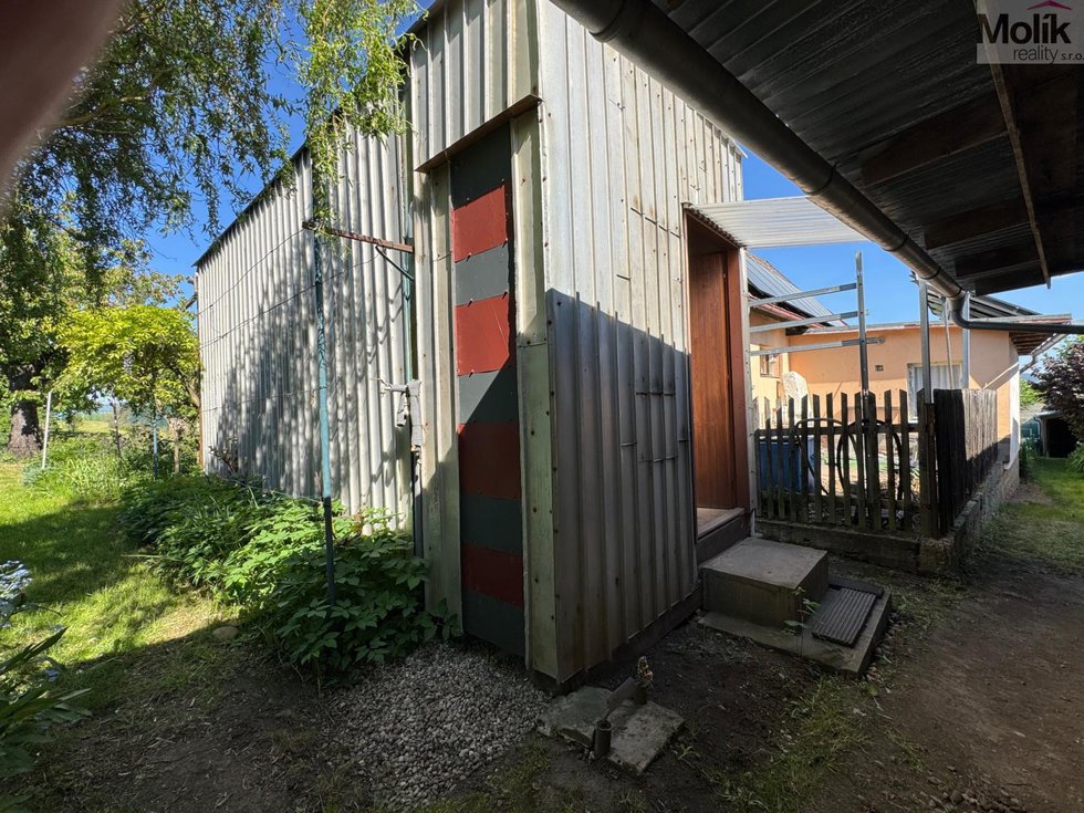 Prodej zahrady 968 m², Havraň