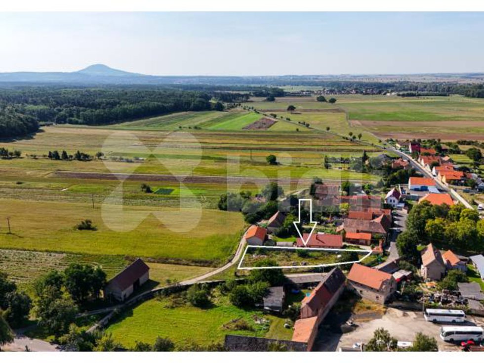 Prodej stavební parcely 1000 m², Chodouny