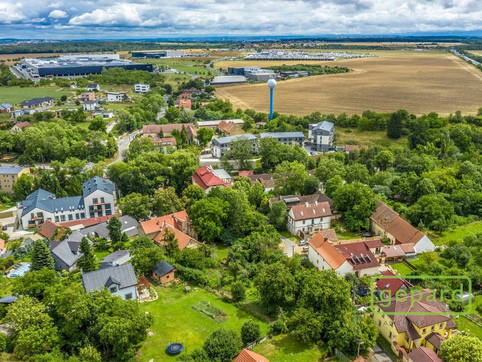 Prodej stavební parcely 1039 m², Tuchoměřice