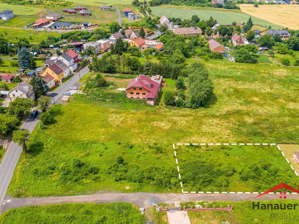 Prodej stavební parcely 1060 m², Modlany