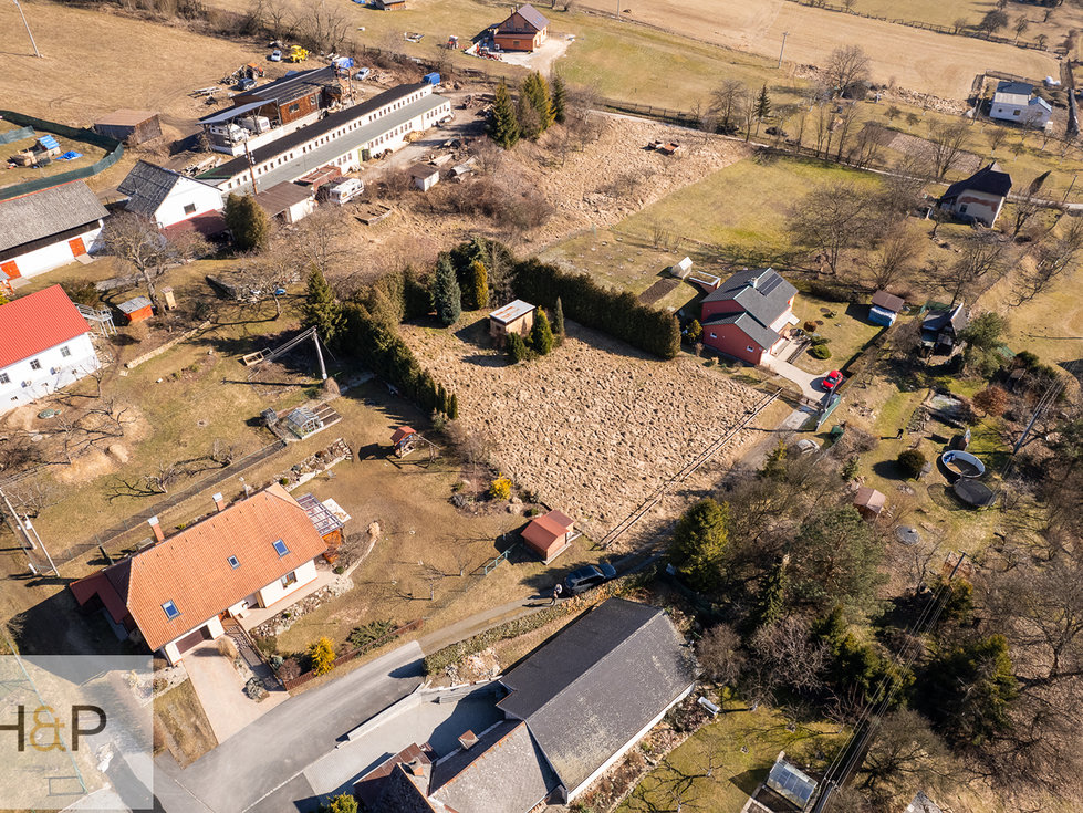 Prodej stavební parcely 1281 m², Bratrušov