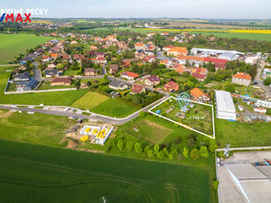 Prodej stavební parcely 1748 m² Nebovidy