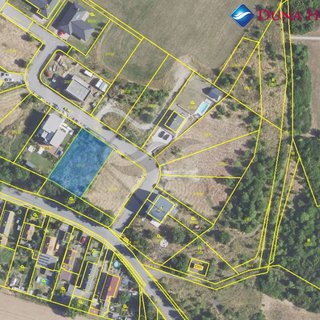 Prodej stavební parcely 1 000 m² Tuchoměřice, Opuková